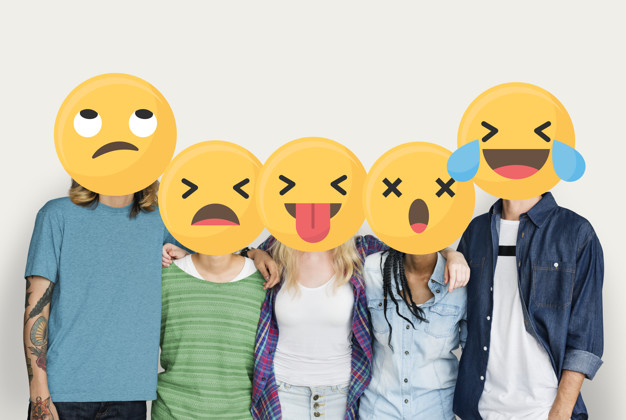 Diverse friends covered with emoticons